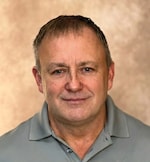 Staff member Melvin Evans from ID_b28924