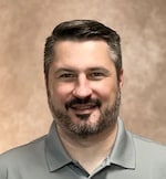 Staff member Adam Scott from ID_2c32a9