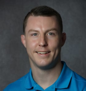 Staff member Mack Brown from ID_d36032c18e14