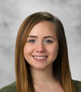 Staff member Lela Loredo from ID_7084a97c5700