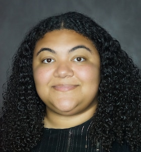 Staff member Kayla Reyes from ID_7084a97c5700