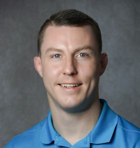 Staff member Mack Brown from ID_d36032c18e14