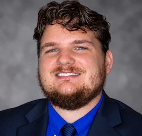 Staff member Montgomery McGee from ID_e9baa1e7f766