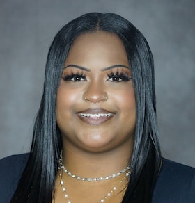 Staff member Adrianna Lewis from ID_9aa2877200ed