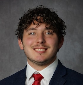 Staff member Logan Campbell from ID_e9baa1e7f766