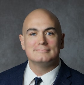 Staff member Courtland Roberts from ID_e9baa1e7f766