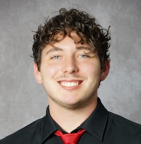 Staff member Logan Campbell from ID_e9baa1e7f766