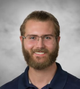 Staff member Chandler Smith- Asst Manager from ID_cb6a98ba686f