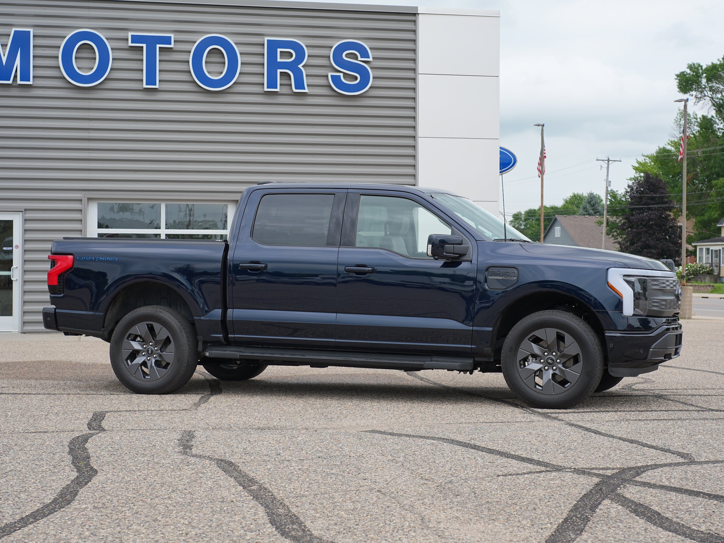 Used 2022 Ford F-150 Lightning Lariat with VIN 1FT6W1EV7NWG10453 for sale in Cokato, MN