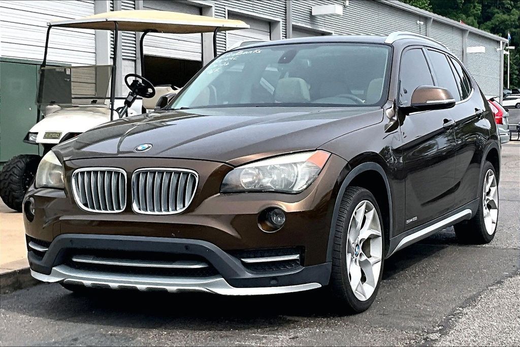 Used 2015 BMW X1 28i with VIN WBAVM1C59FV315797 for sale in Olive Branch, MS