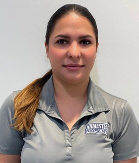 Staff member Milenis Piedra from 4879a7ebd501