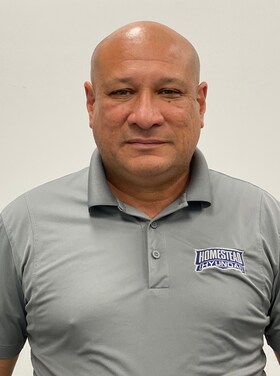Staff member Roberto Guzman from 4879a7ebd501