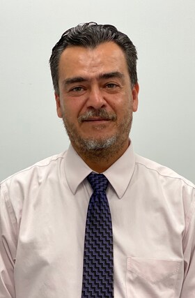 Staff member Alain Poitevin from 4879a7ebd501