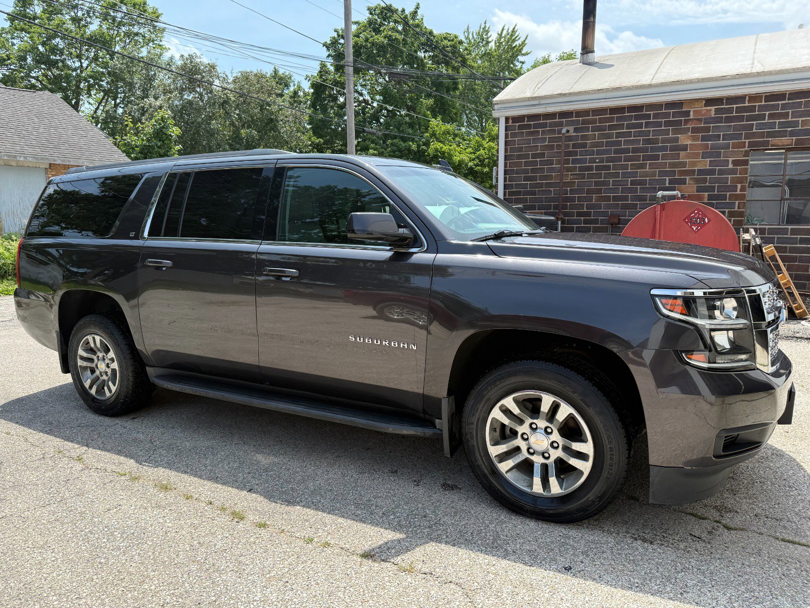 Used 2015 Chevrolet Suburban LT with VIN 1GNSKJKC8FR741704 for sale in Rockwell City, IA