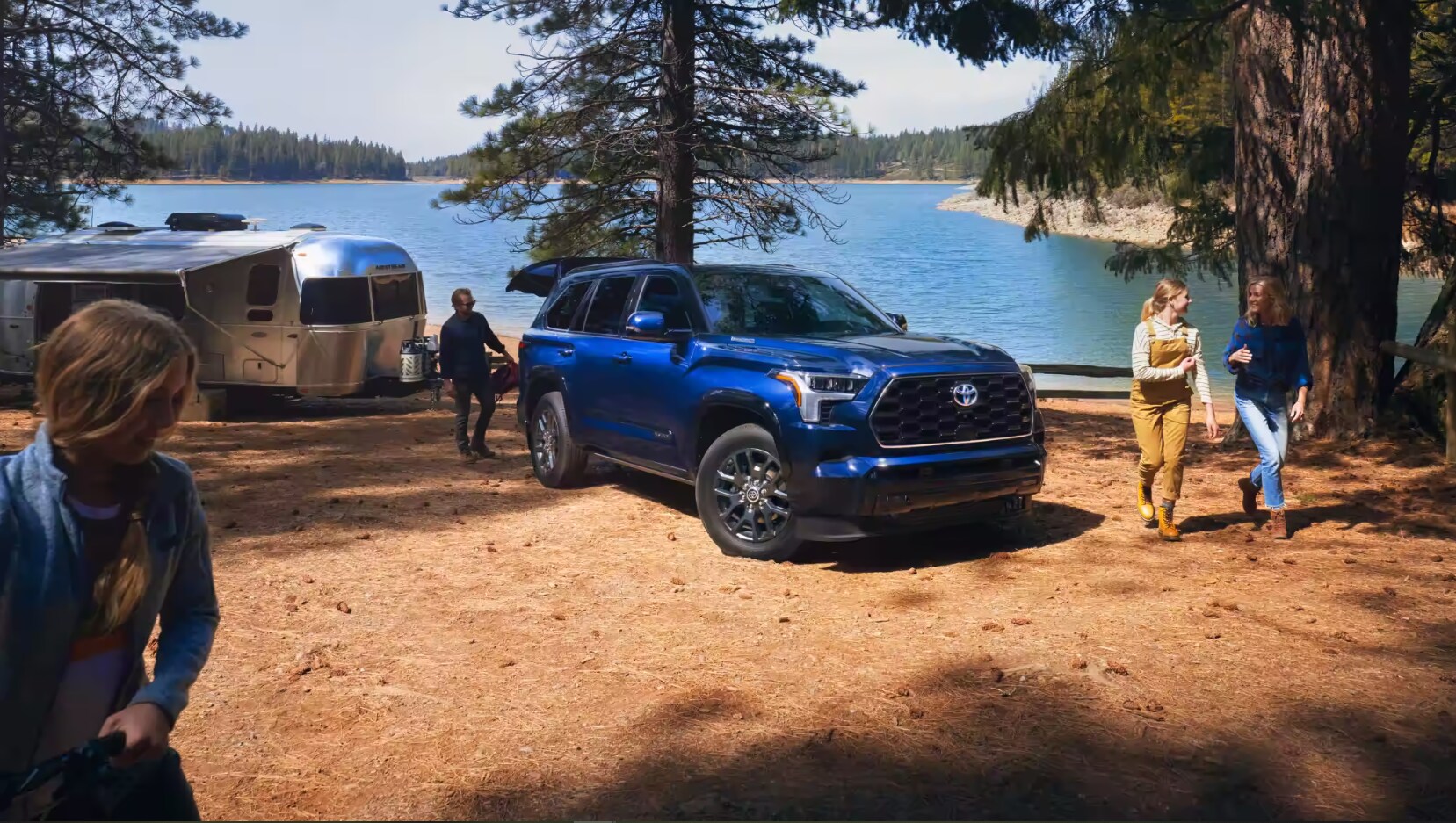 A family enjoying the outdoors with the help of their new Toyota Sequioa.