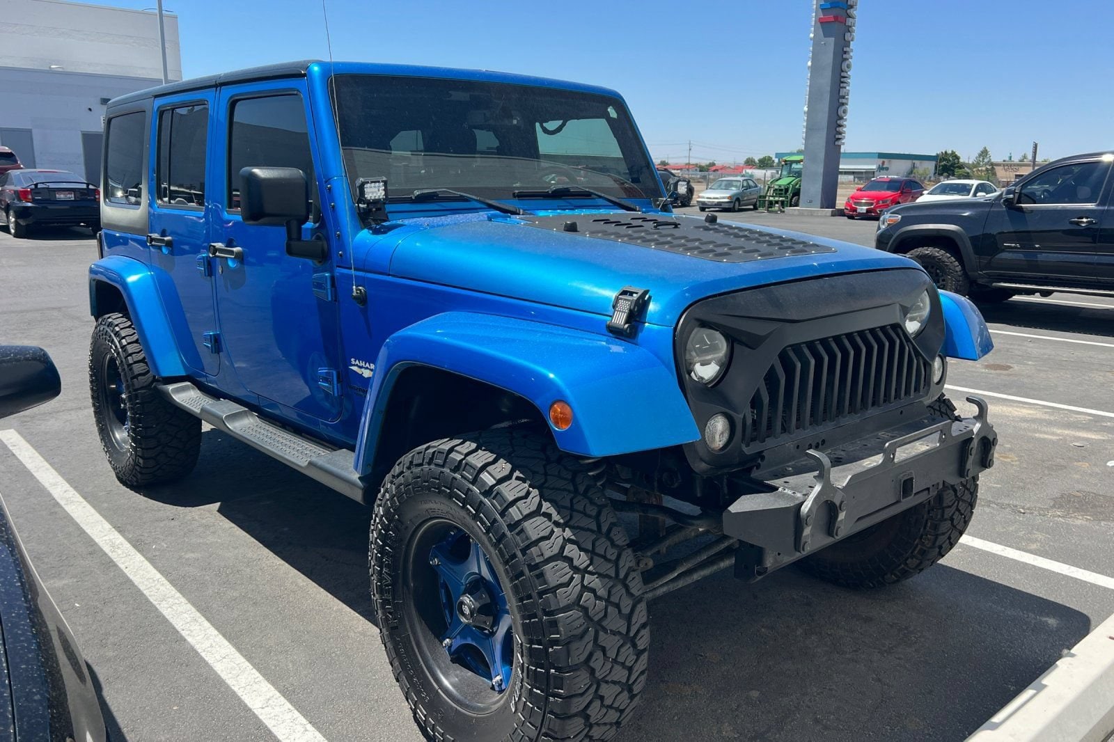 Used 2015 Jeep Wrangler Unlimited Sahara with VIN 1C4BJWEG9FL610954 for sale in Ontario, OR