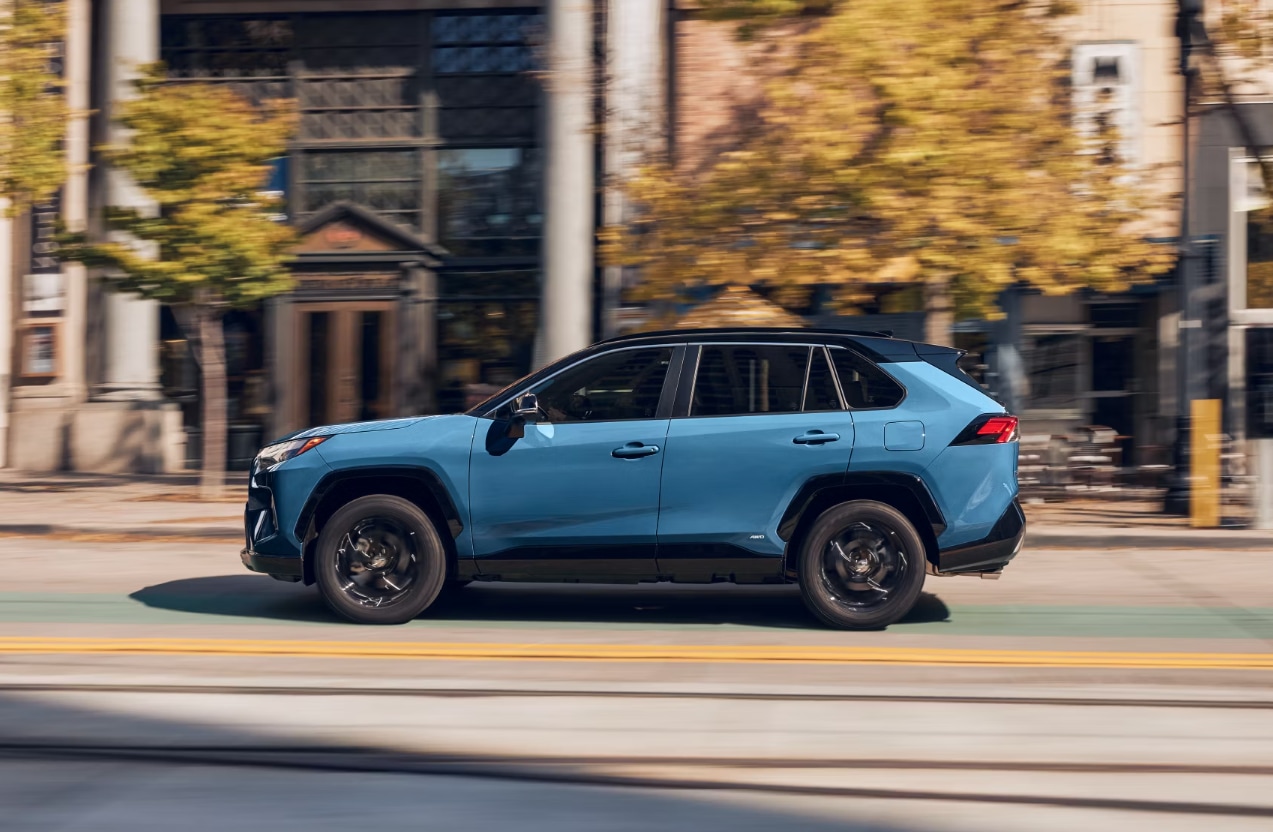 Screenshot%202025-03-18%20203819.png Blue RAV4 driving in the city.