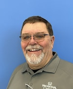 Staff member John Peterson from ID_6dc0d9