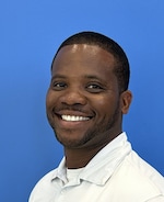 Staff member Chris Hippolyte from ID_4f9284
