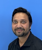 Staff member Arjun Karotia from ID_4f9284