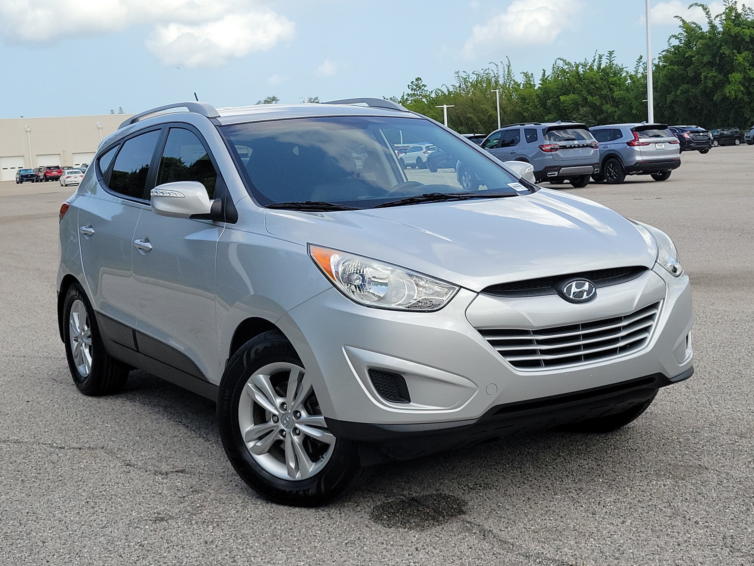 Used 2012 Hyundai Tucson GLS with VIN KM8JU3AC7CU509093 for sale in Bradenton, FL