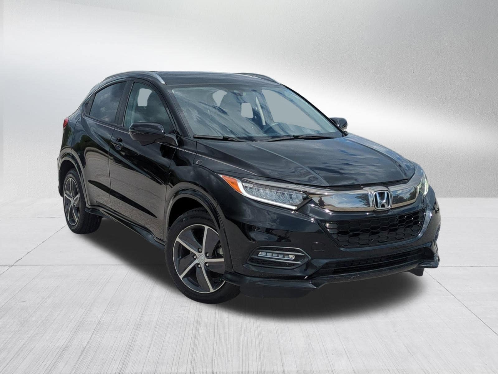 Used 2019 Honda HR-V Touring with VIN 3CZRU6H95KM702858 for sale in Bradenton, FL