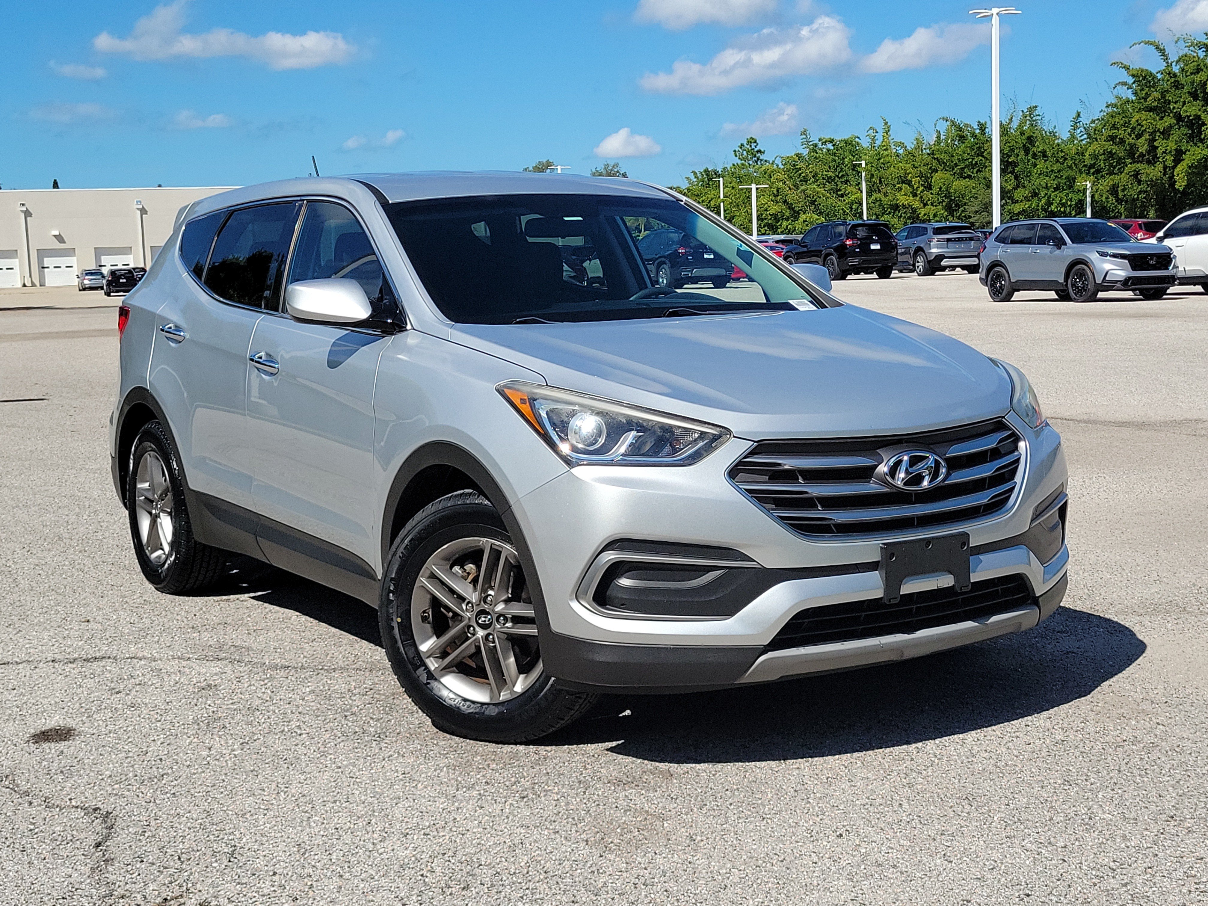 Used 2018 Hyundai Santa Fe Sport with VIN 5XYZT3LB4JG546020 for sale in Bradenton, FL