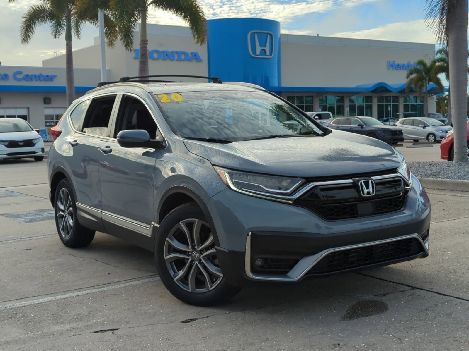 Used 2020 Honda CR-V Touring with VIN 2HKRW1H99LH418384 for sale in Bradenton, FL