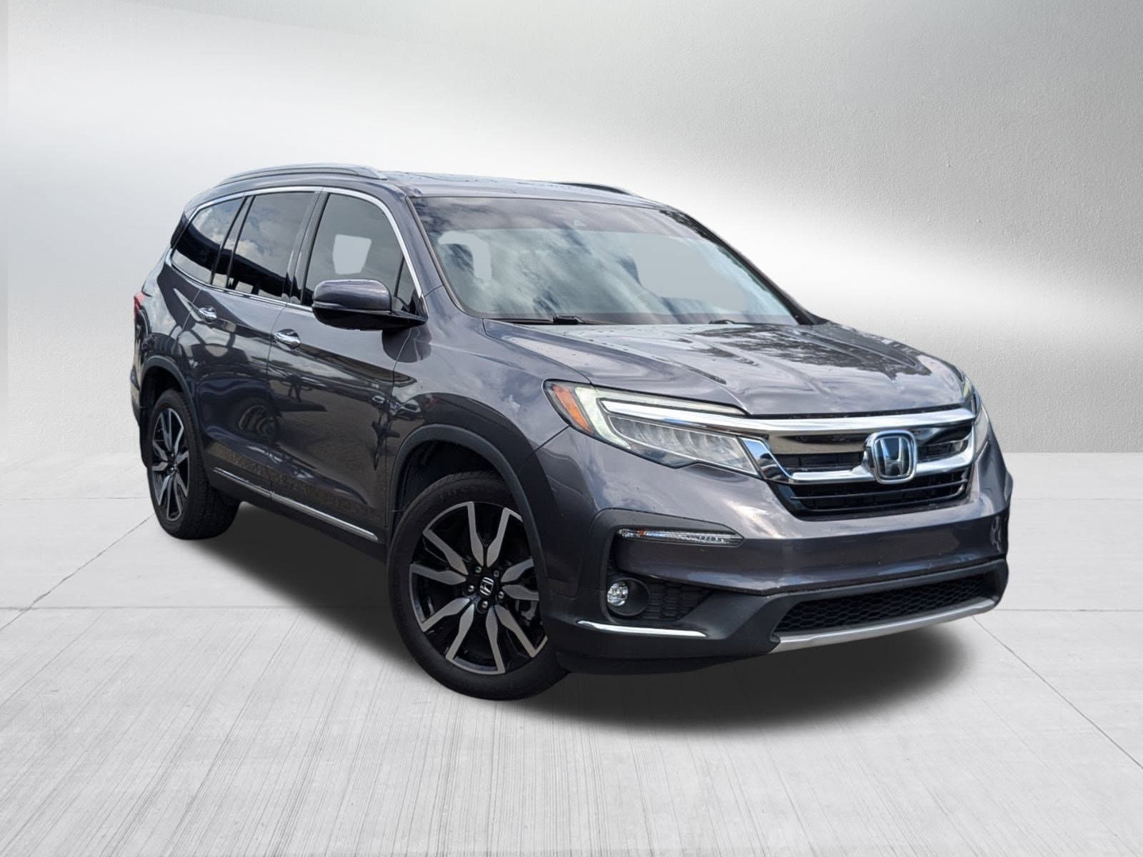 Used 2021 Honda Pilot Touring with VIN 5FNYF5H6XMB000859 for sale in Bradenton, FL