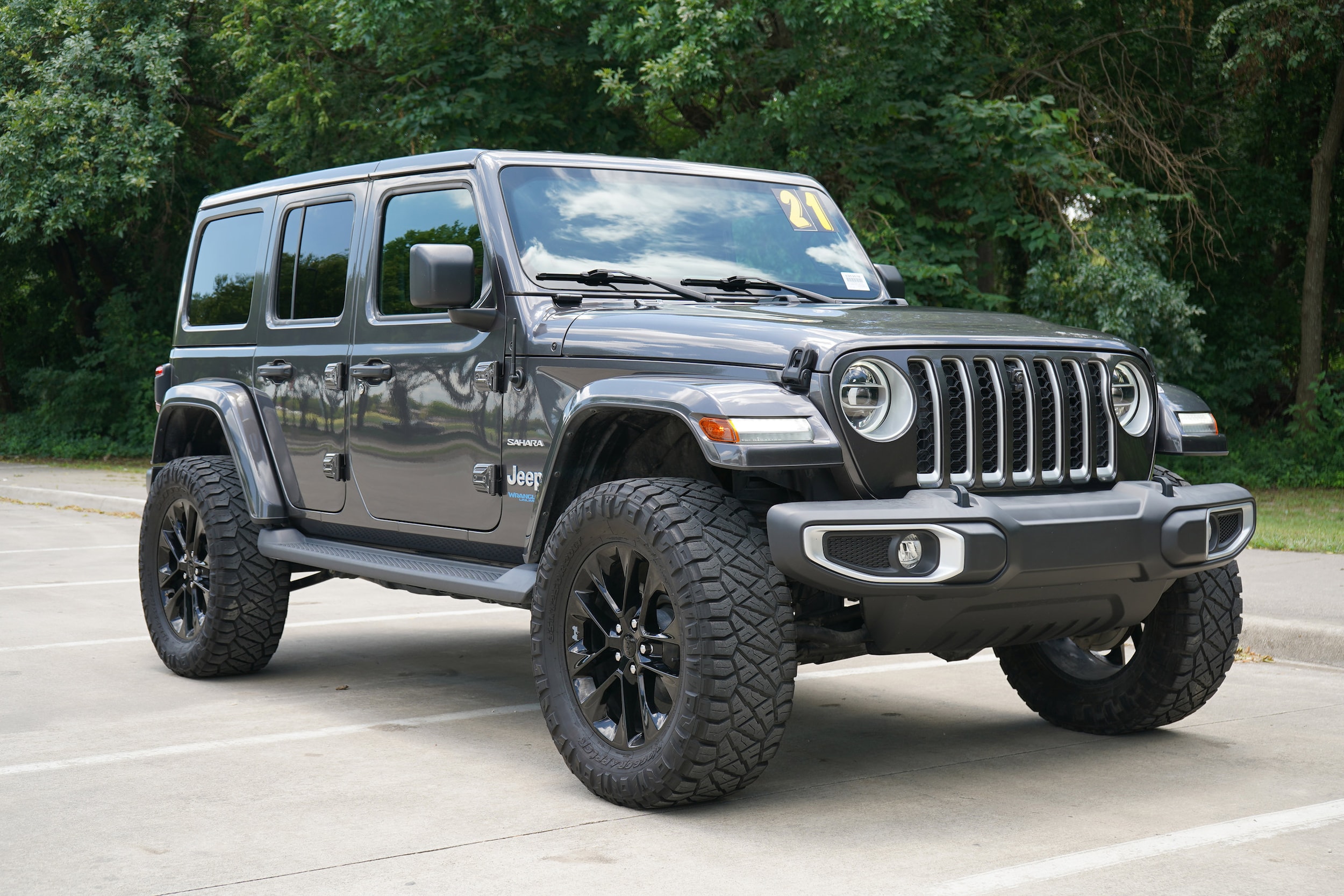 Used 2021 Jeep Wrangler Unlimited Sahara 4XE with VIN 1C4JJXP65MW734799 for sale in Mckinney, TX