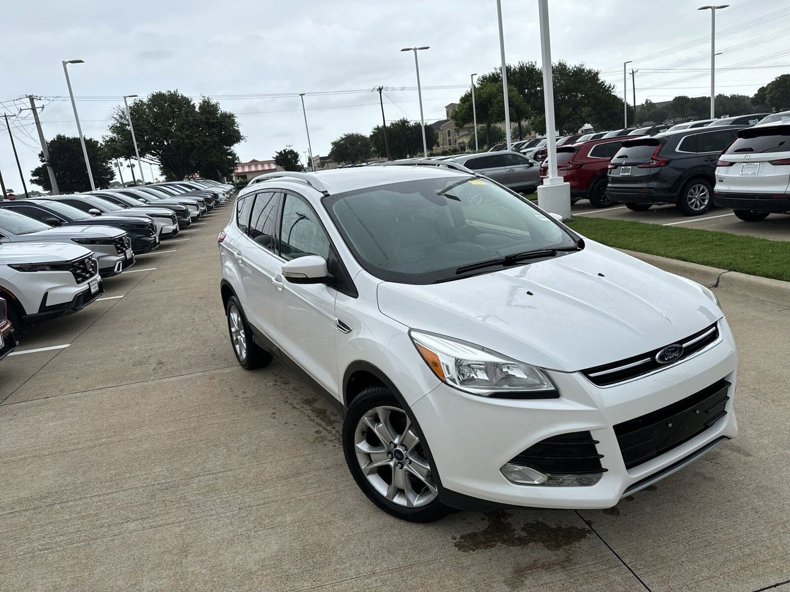 Used 2014 Ford Escape Titanium with VIN 1FMCU0J96EUE11476 for sale in Mckinney, TX