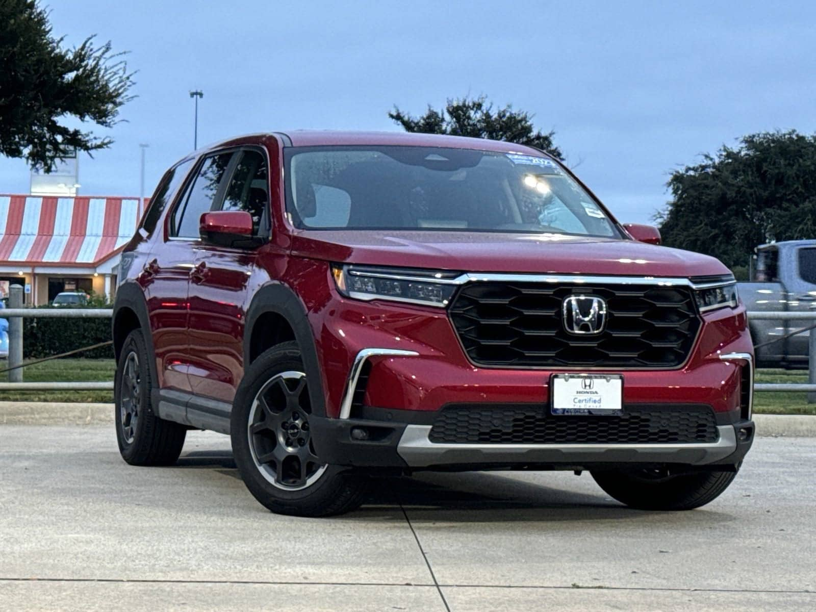 Certified 2023 Honda Pilot EX-L with VIN 5FNYG2H51PB010610 for sale in Mckinney, TX