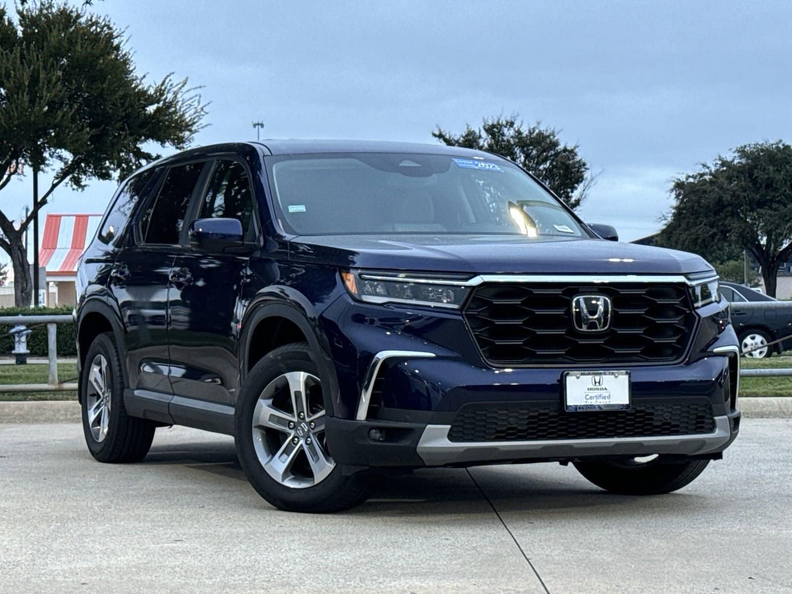 Certified 2023 Honda Pilot EX-L with VIN 5FNYG1H49PB028001 for sale in Mckinney, TX