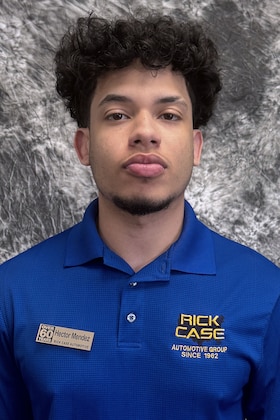 Staff member Hector Mendez from 5331ef126531