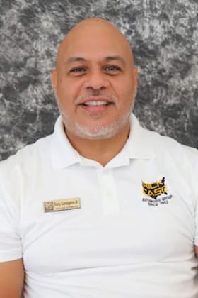 Staff member Tony Cartagena Jr. from 4ce859d93d02