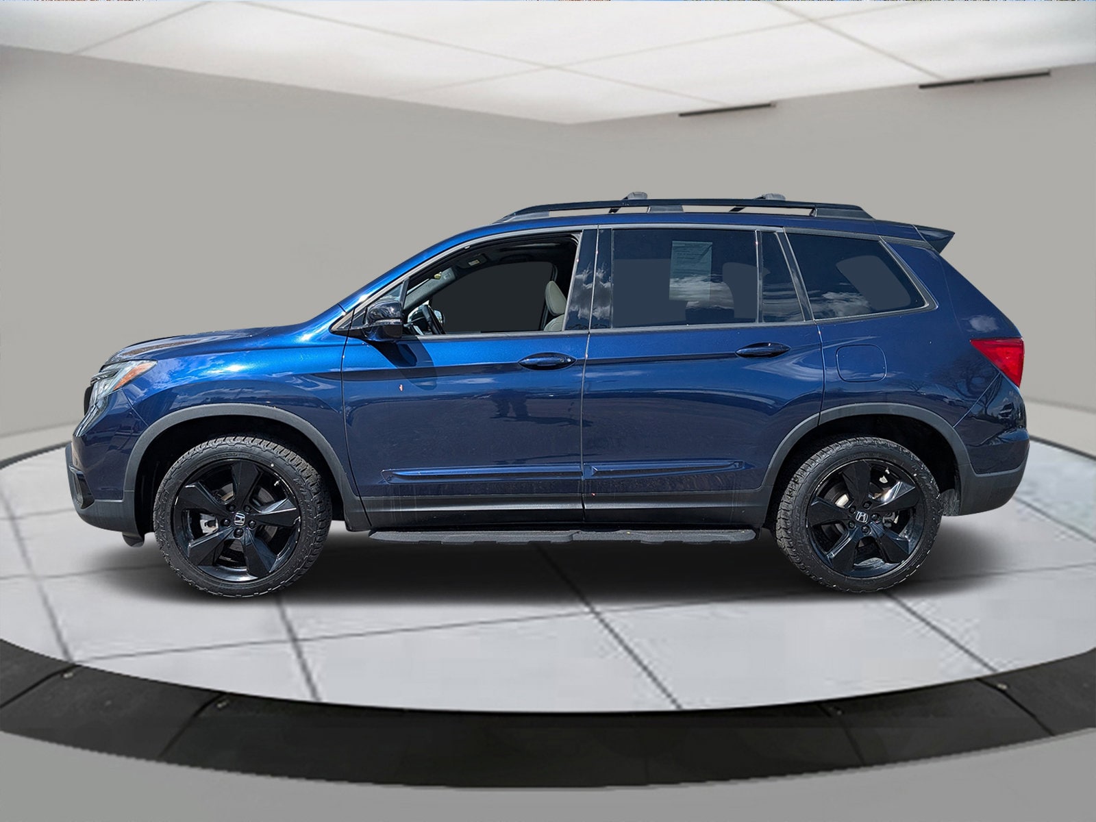 Used 2021 Honda Passport Elite with VIN 5FNYF8H02MB013330 for sale in Greeley, CO