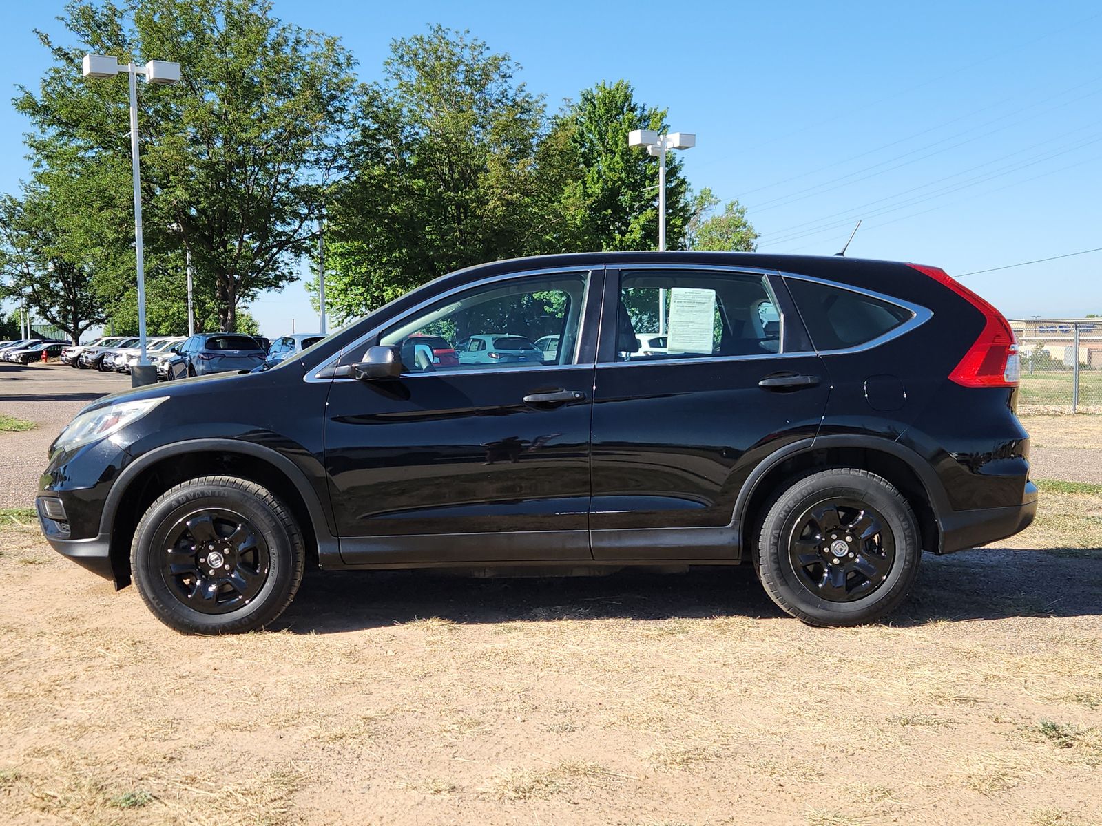 Used 2016 Honda CR-V LX with VIN 2HKRM4H37GH638230 for sale in Greeley, CO