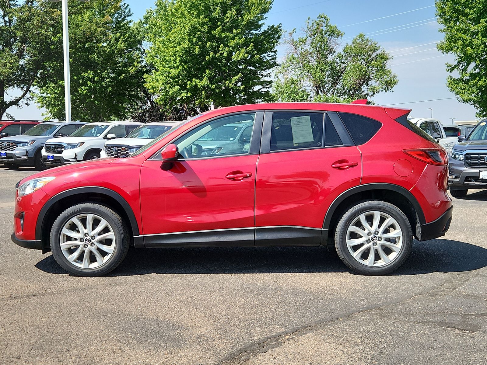 Used 2014 Mazda CX-5 Grand Touring with VIN JM3KE4DY4E0322978 for sale in Greeley, CO