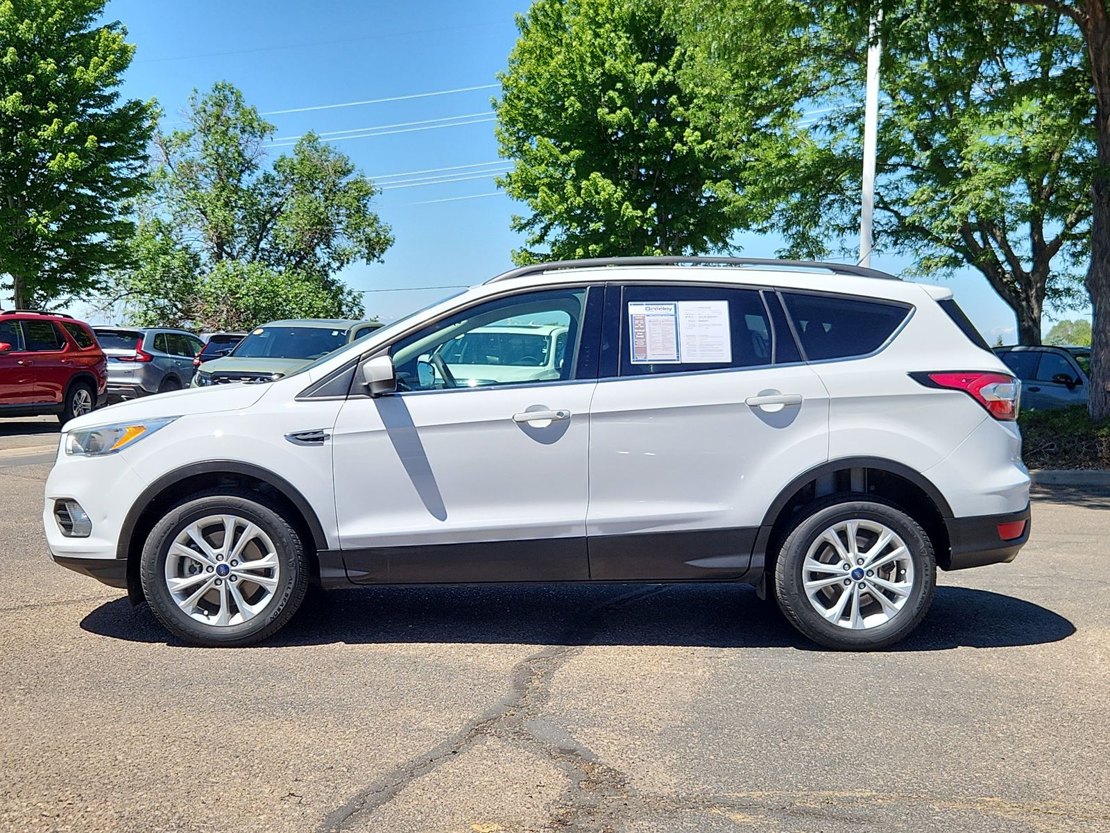 Used 2018 Ford Escape SE with VIN 1FMCU9GD1JUA75004 for sale in Greeley, CO