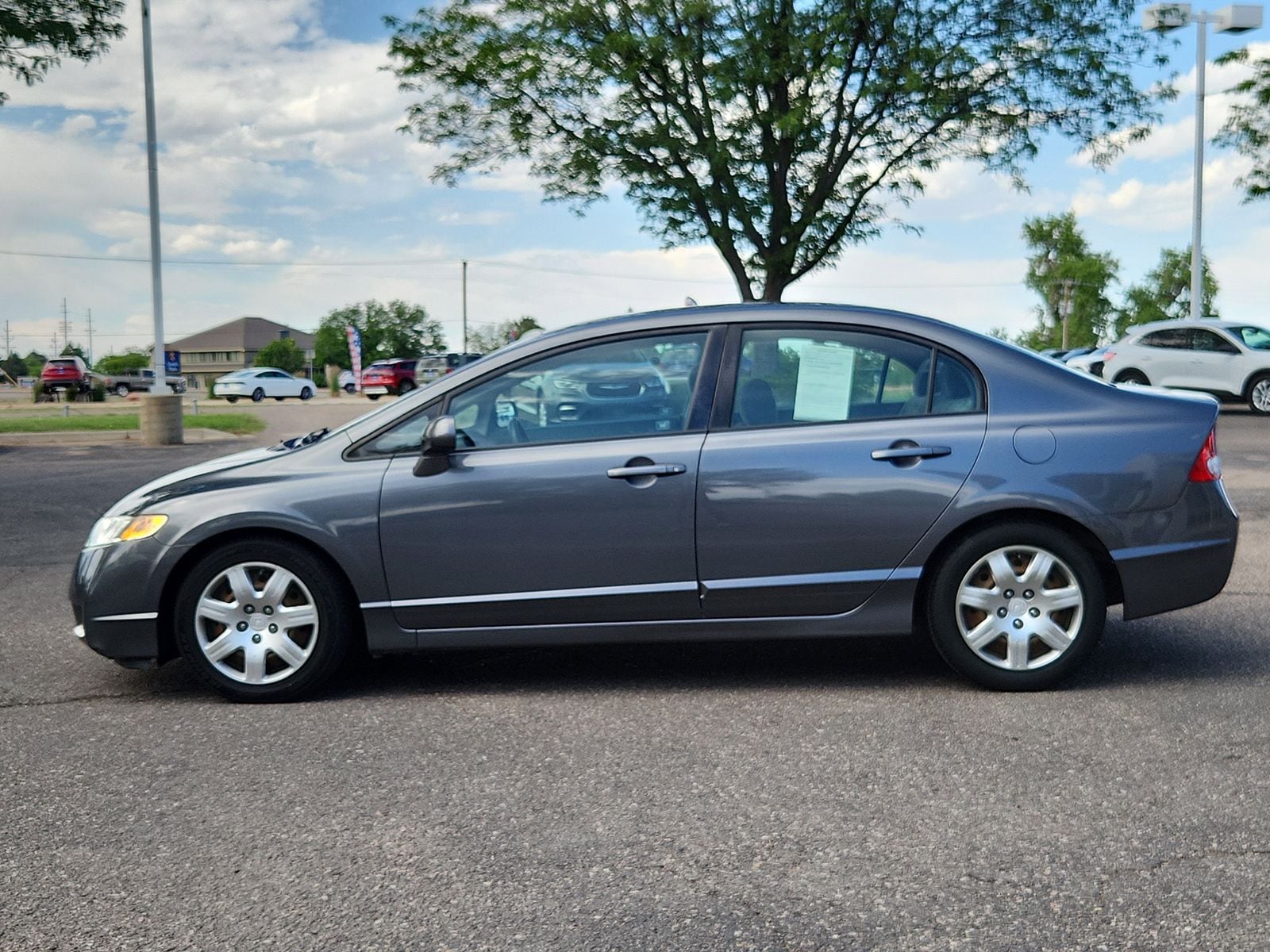 Used 2010 Honda Civic LX with VIN 2HGFA1F55AH305881 for sale in Greeley, CO