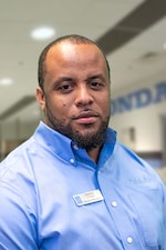 Staff member Davern Malcolm from ID_bd25c938baee