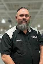 Staff member Michael Veleke from ID_0614950c9222
