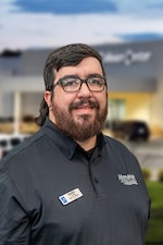 Staff member Patrick Belk from ID_5ac31656eec2