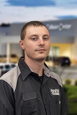Staff member Andrew Norman from ID_f94567d67e32