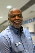 Staff member George Gillespie from ID_bd25c938baee