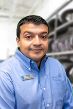 Staff member Juan Cuarezma from ID_ac39d6fc1fb1