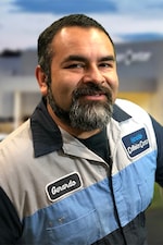 Staff member Gerardo Quintana from ID_f94567d67e32