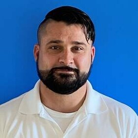 Staff member Alex Rogers from ID_23ed1cf5b510