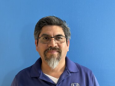 Staff member Jorge Huazo from ID_3443801066de