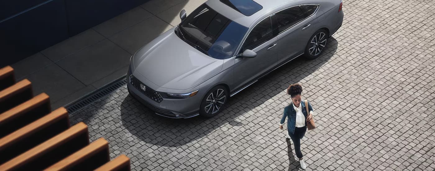 Grey 2025 Honda Accord Touring parked on a stone street